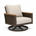 Poltrona girevole in metallo e rattan sintetico con cuscini beige